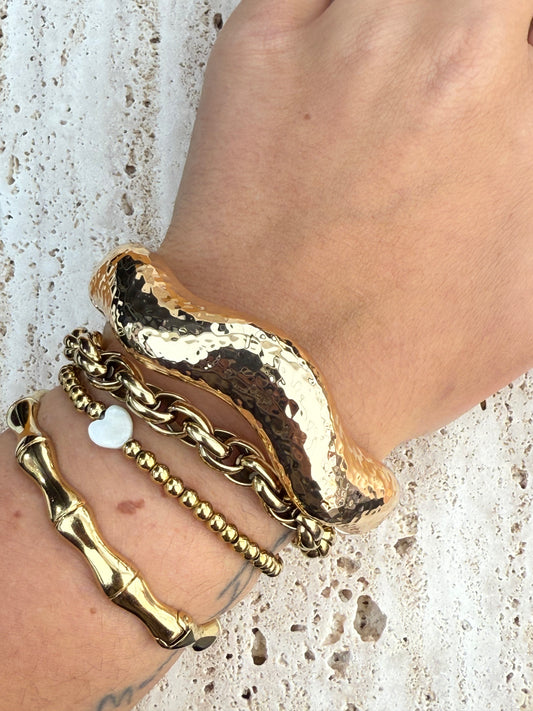 Golvende gouden armband