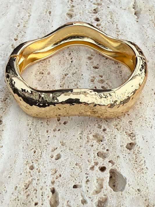 Golvende gouden armband